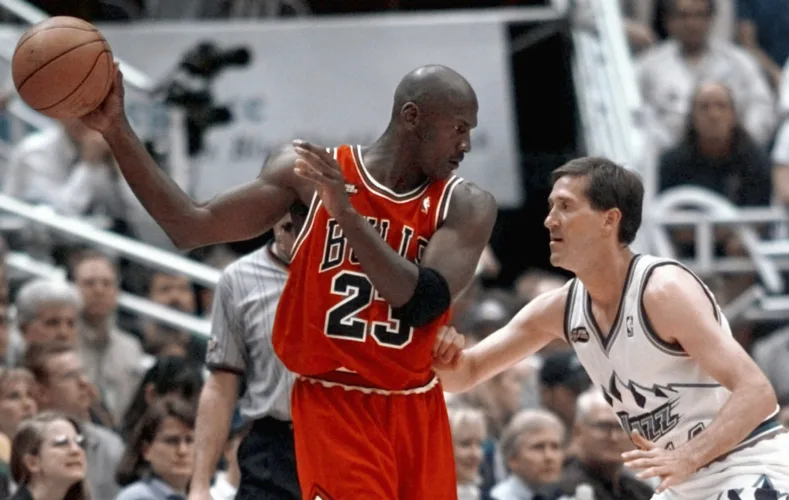 Michael Jordan jersey sets $14 million record for basketball memorabilia, auction house says